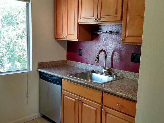 Beautiful granite, full sized deeper sink, gooseneck faucet with pull down sprayer, full size dishwasher.
