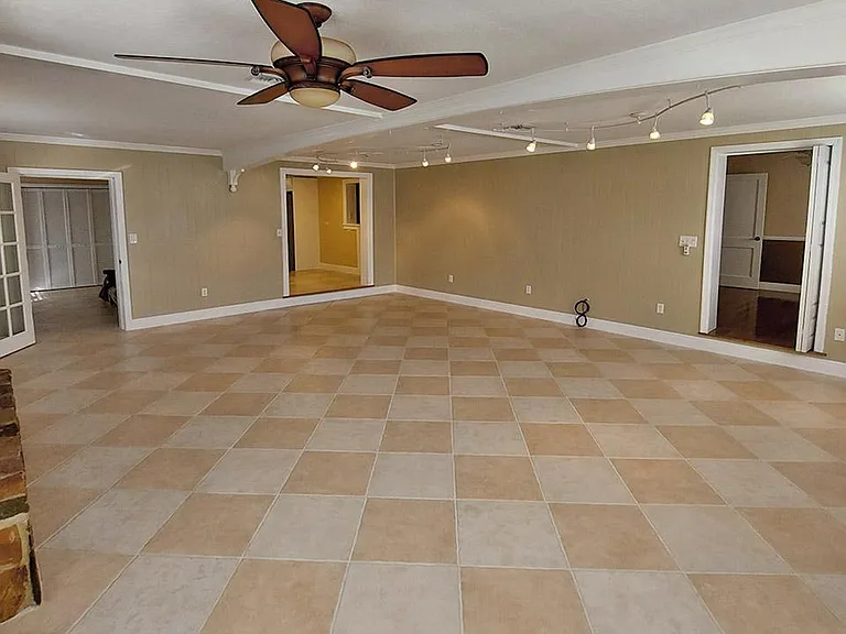 Living Room - View looking towards Kitchen, Bonus Room /Laundry, and Bedroom 2