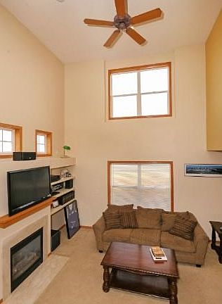 The living room is complete with a gas burning fireplace.