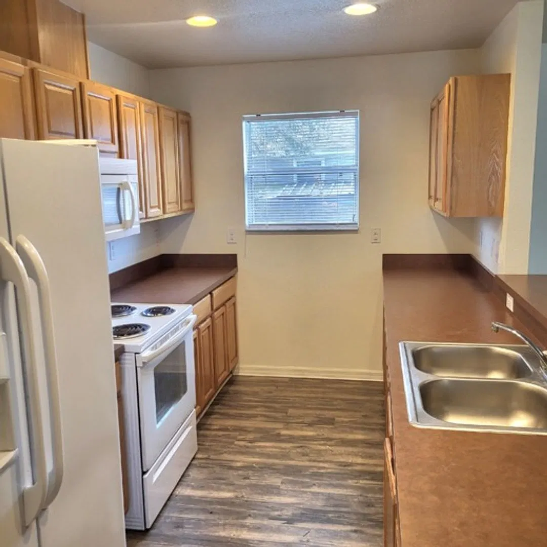 Well Laid Out 4 Bed/ 2 Baths with large Living/Dining and Vinyl Floors throughout on Partially Fe... — Photo 2