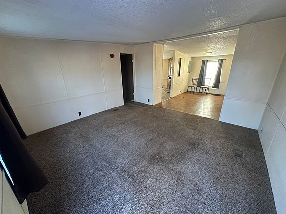 Living room as you enter from door.