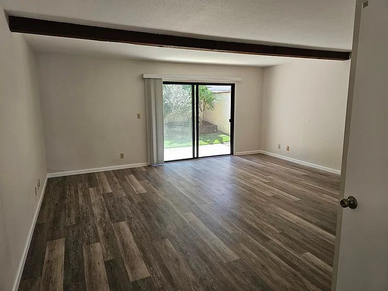Masterbedroom looking towards outdoor patio.