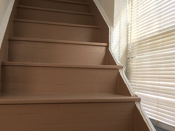 Newly Refinished Wood Stairs Up to Bedroom