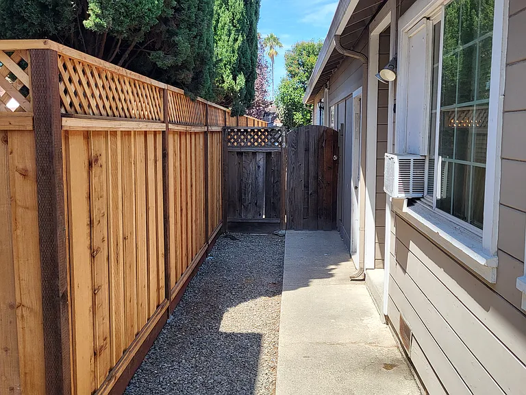 Pathway leading to privacy gate (includes locking doorknob)