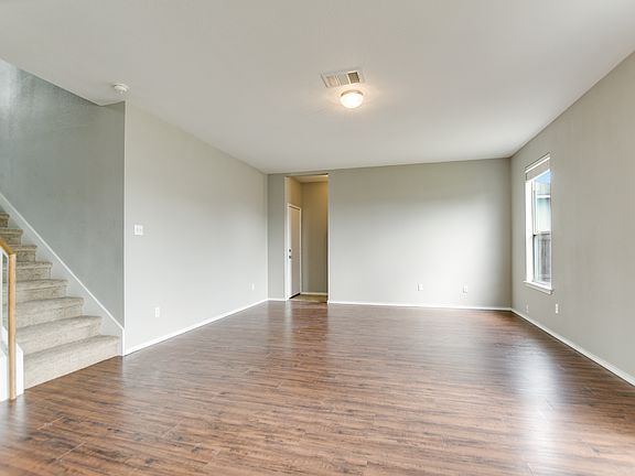 Family Room with Laminate wood Flooring