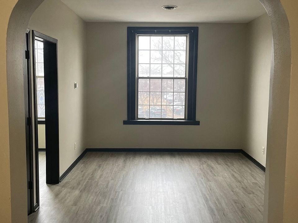 Living room with large bay windows