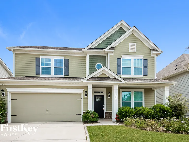 7815 Sawgrass Ln — Photo 1
