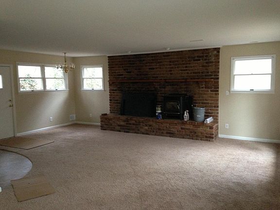 Living area with fireplace complete with pellet stove