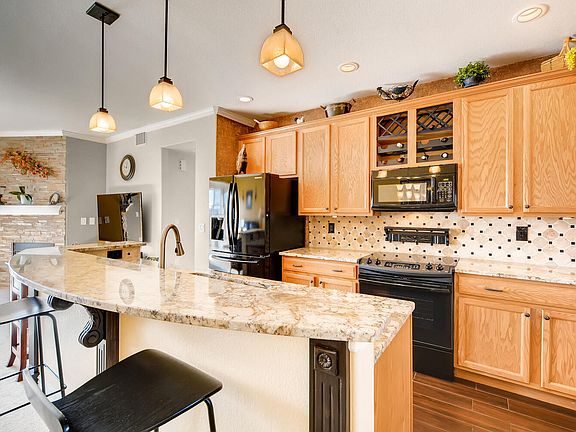 2nd image of 10290 W 55th Ln Unit 204