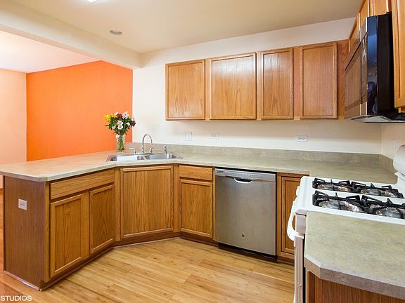 Stove, Refrigerator, Dishwasher and built-in microwave.