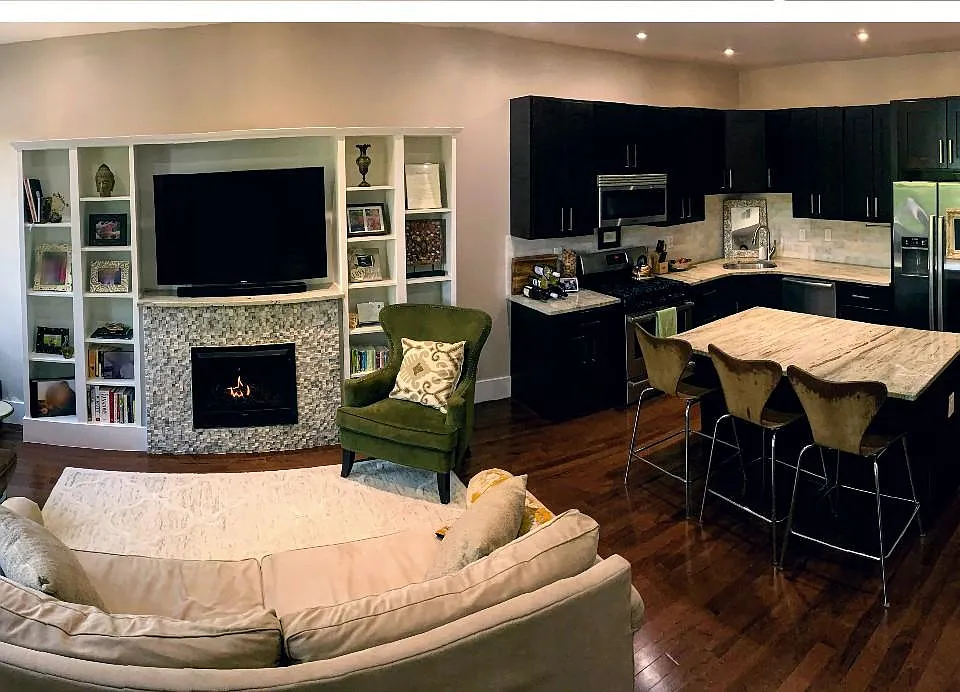 Spacious family room and kitchen with fireplace