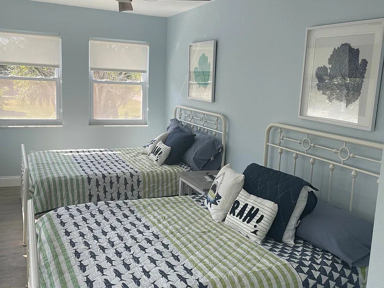 Third bedroom with two full beds.