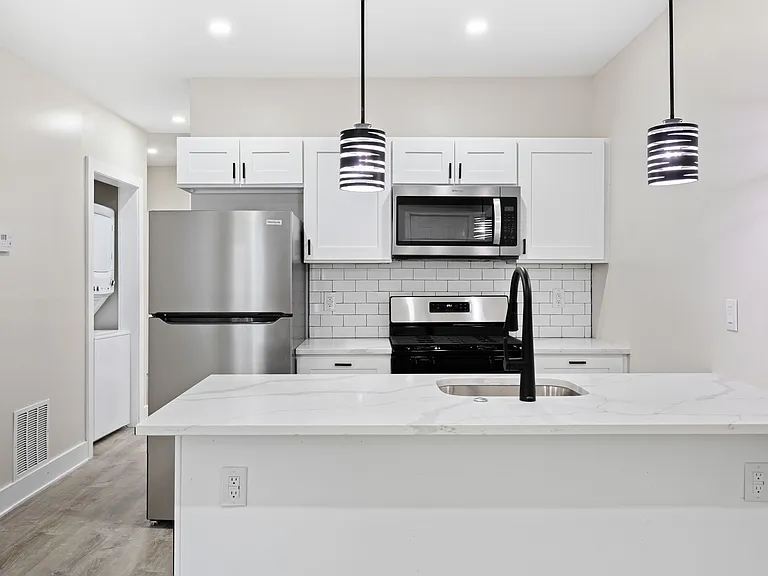 Unit 1 kitchen with bar seating