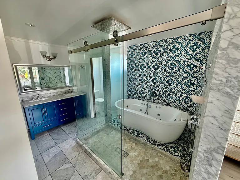 Shower for multiple adults and largest Jacuzzi Tub with jets and water fountain faucet