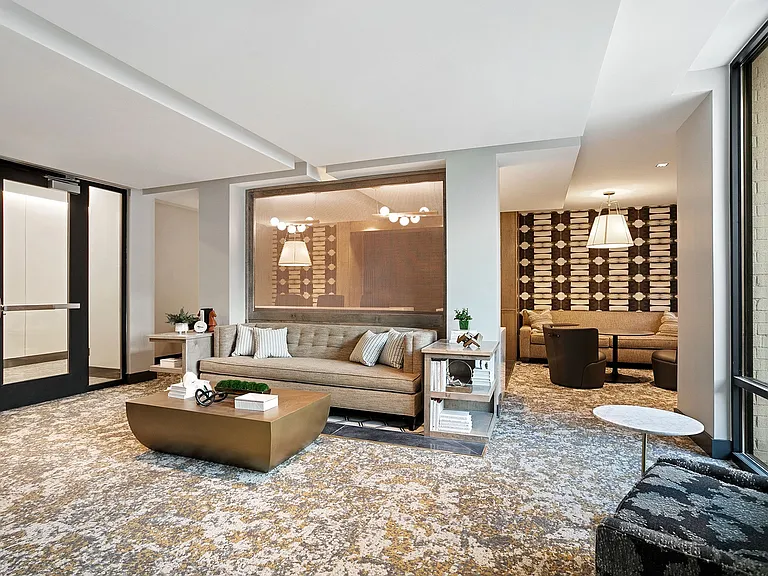 Multi-use business lounge with private work stations, conference room and co-working areas