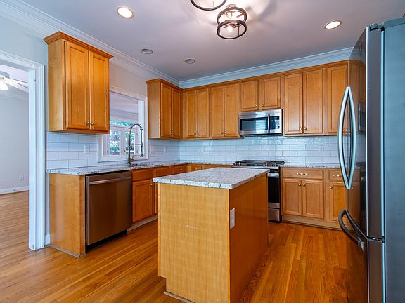 Enjoy this modern, spacious kitchen with ample cabinet space