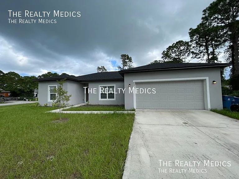 491 Ixora Ave NW — Photo 1
