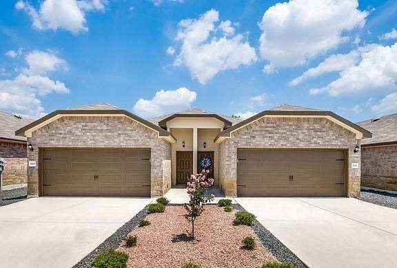 This property is a single-floor duplex property. You share a wall with your neighbor. Both of the properties are the mirror image of each other.