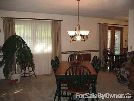 Formal dining
						:
						Large formal dining room with new light fixture.