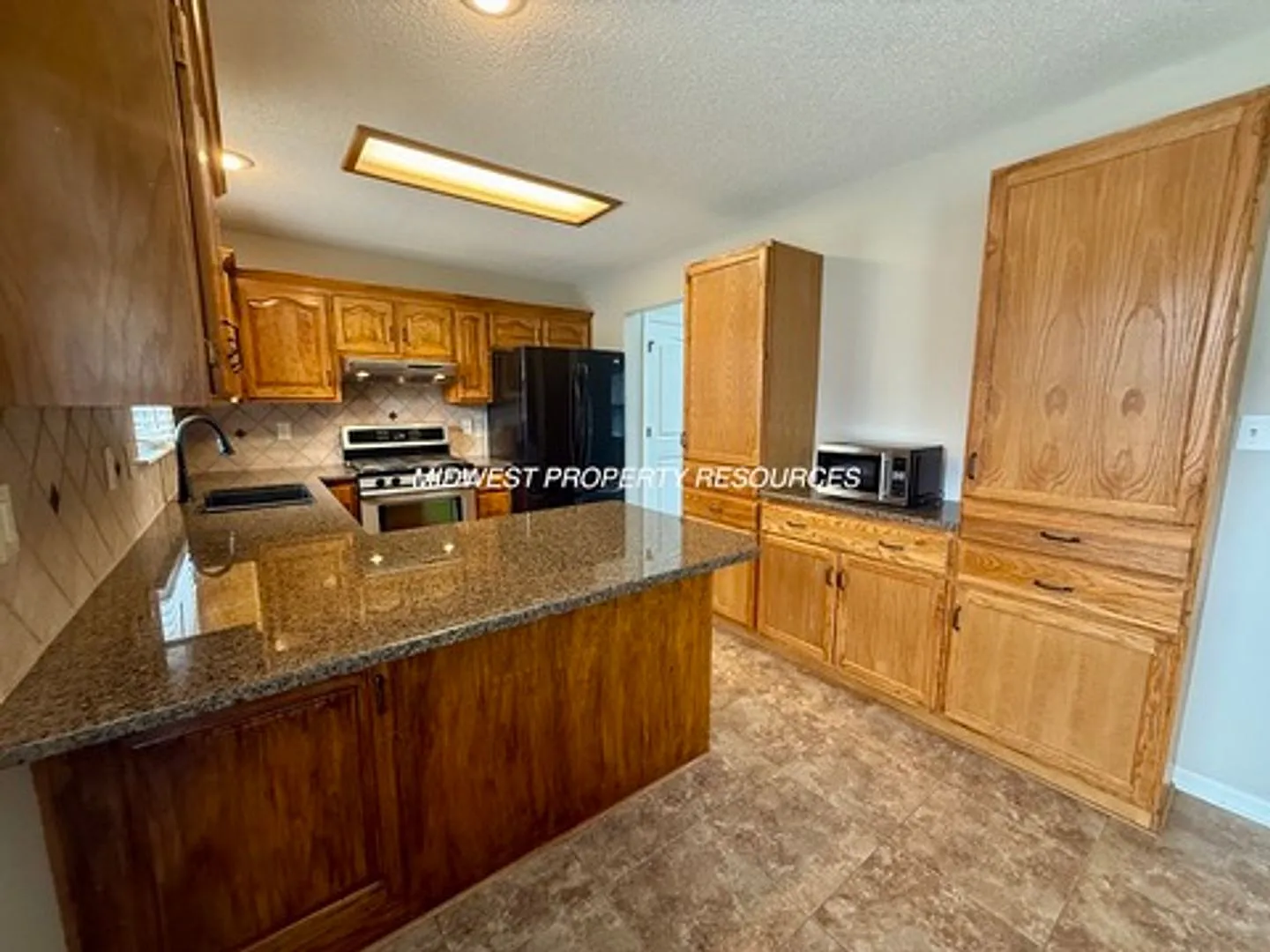 Spacious 3 Bed, 2.5 Bath Home with Finished Basement & Fenced Yard. — Photo 2