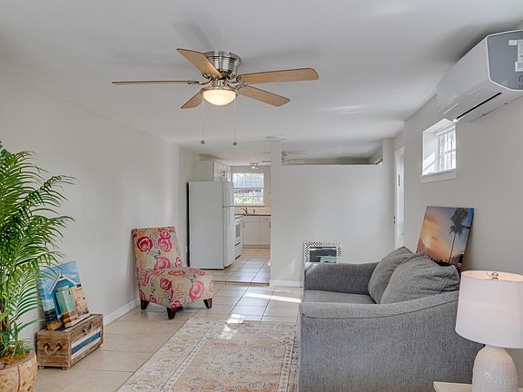 Living area open to kitchen and 3/4 bath