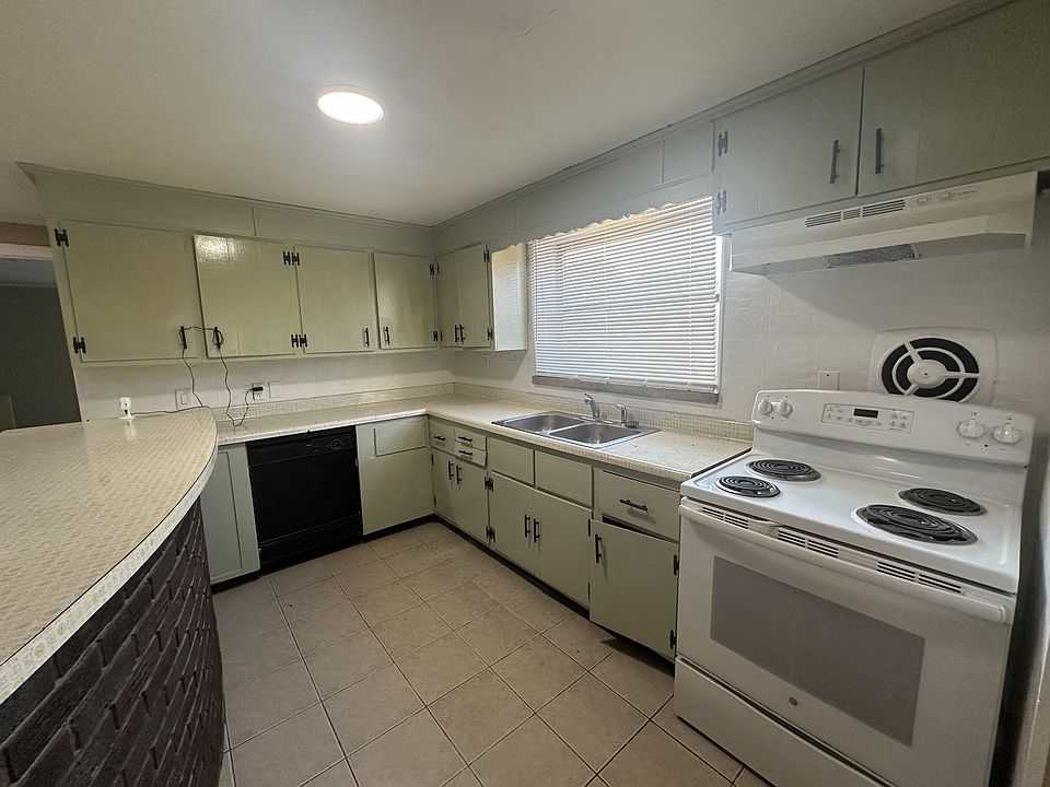 Kitchen with wrap-around counter bar