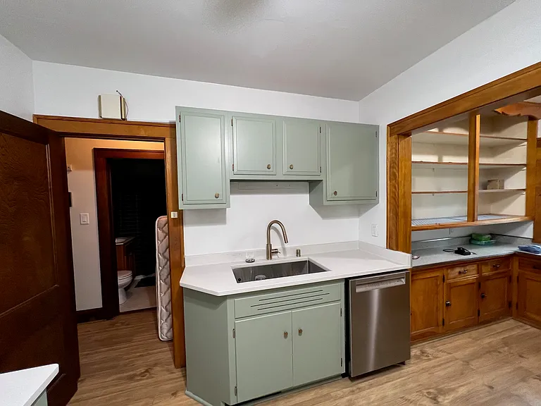 Kitchen with attached pantry