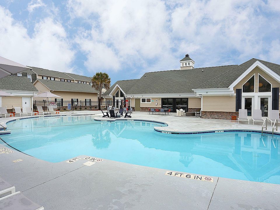 Experience the ultimate relaxation at our luxurious poolside, perfect for sunny days.