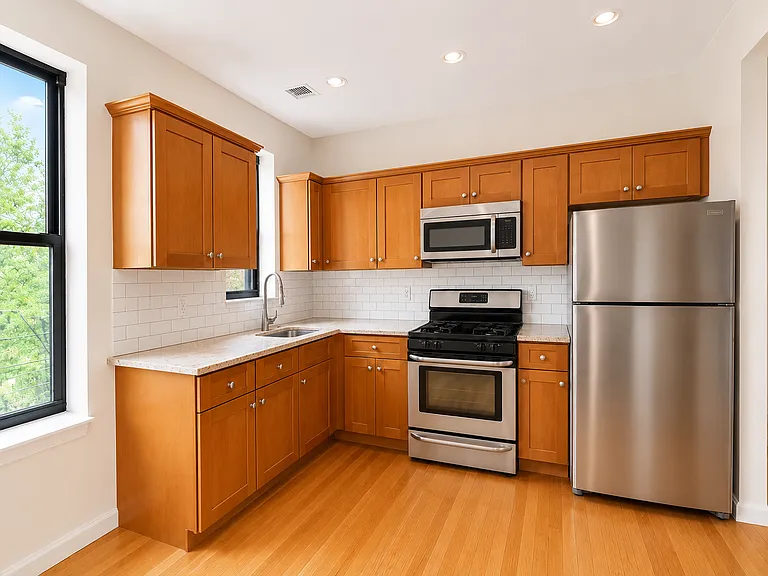 6662 Fresh Pond Rd #3L — Photo 2