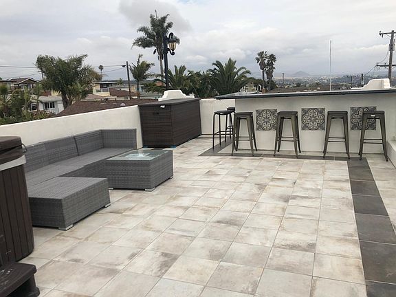 Rooftop Deck - think of entertaining at your own private bar with barbecue, refrigerator, bar sink, spa, LED lighting and storage.