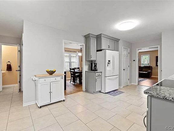 Updaed Kitchen. Tile floor and Refrigerator