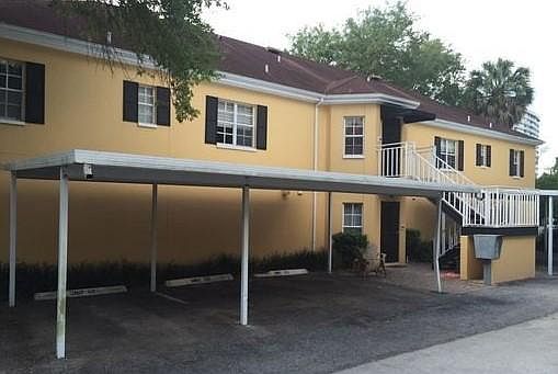Back of condo - 1 dedicated carport space and additional guest spaces