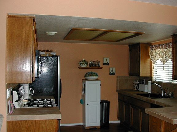 Kitchen window faces East.