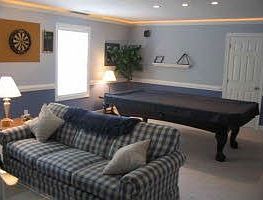 Pool Table with hidden rope light above crown molding for ambiance