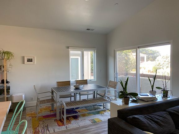 Open kitchen & living room/dining room area; balcony