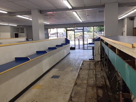 ILooking East to McCadden Place. (All this stuff will be removed soon) Almost clear span- just a couple of columns. Keep open or divide to suit.