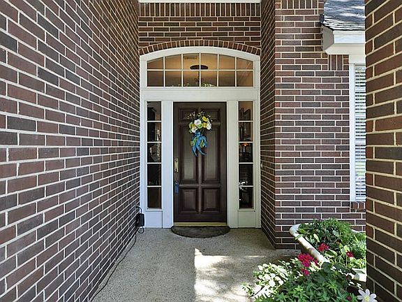 Custom painted front door welcomes guests.
