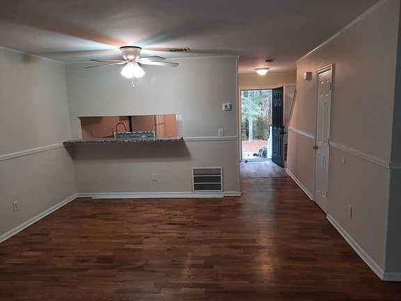 Family room viewing dining area and front foyer.