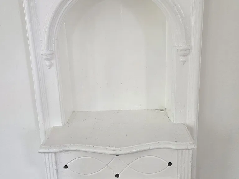 Phone charging station (outlet hidden under the shelf)