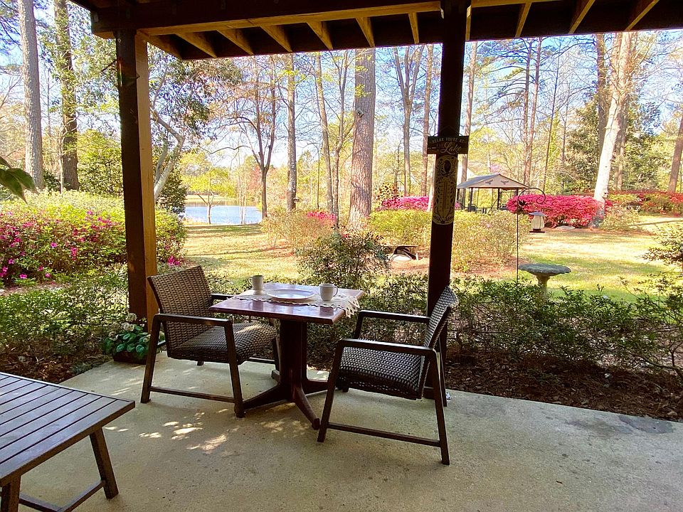Your private patio overlooking the large backyard and pond