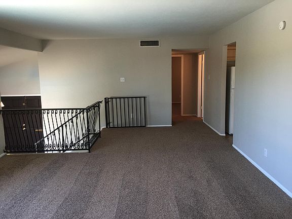 Huge formal living room upstairs off of the kitchen and form