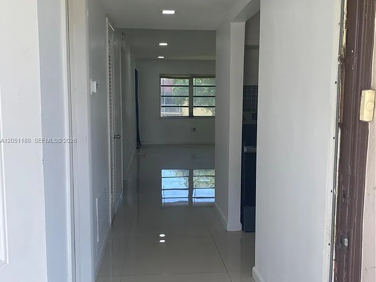 1550 NE 191st St #309 — Photo 11