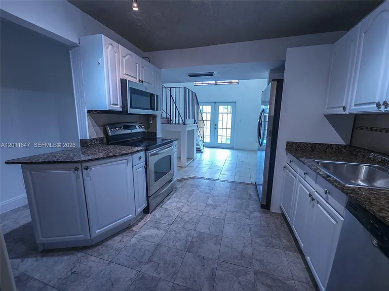 10907 N Kendall Dr #313 — Photo 4