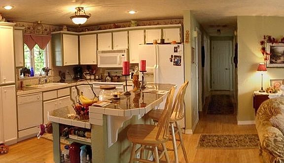 Open floor plan creates warmth and coziness.