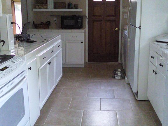 New floor/loads of cabinets