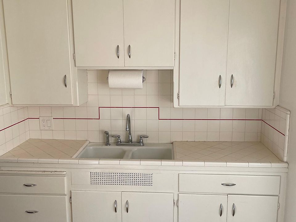 Photo of the kitchen area with plenty of cabinet space.