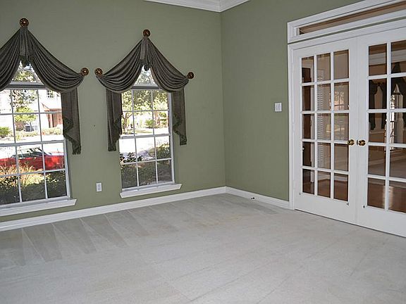 Large Private Study with French Doors & Transom Open to Foyer