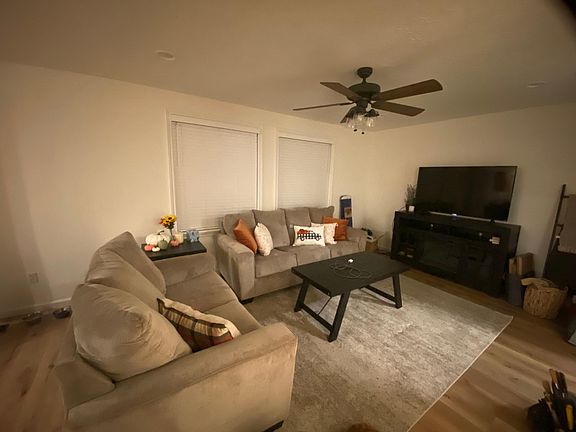 Family room (couches, coffee table set, TV stand all included)