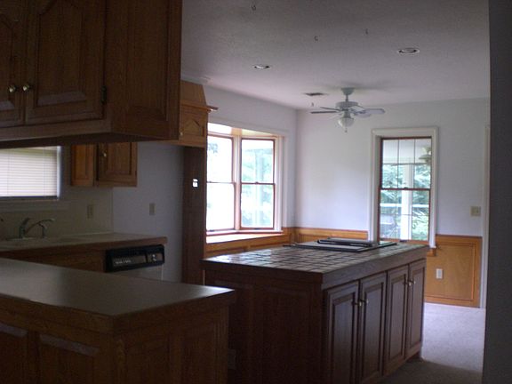 Dining to kitchen and breakfast area beyond