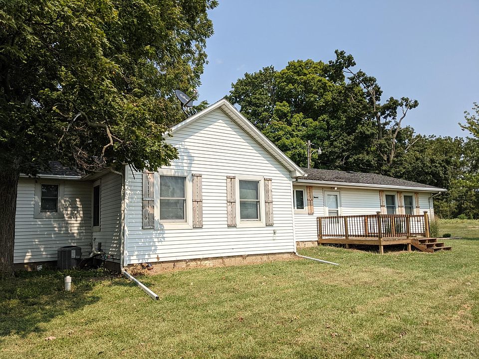 There is a deck at the front door and back door to enjoy country living.
